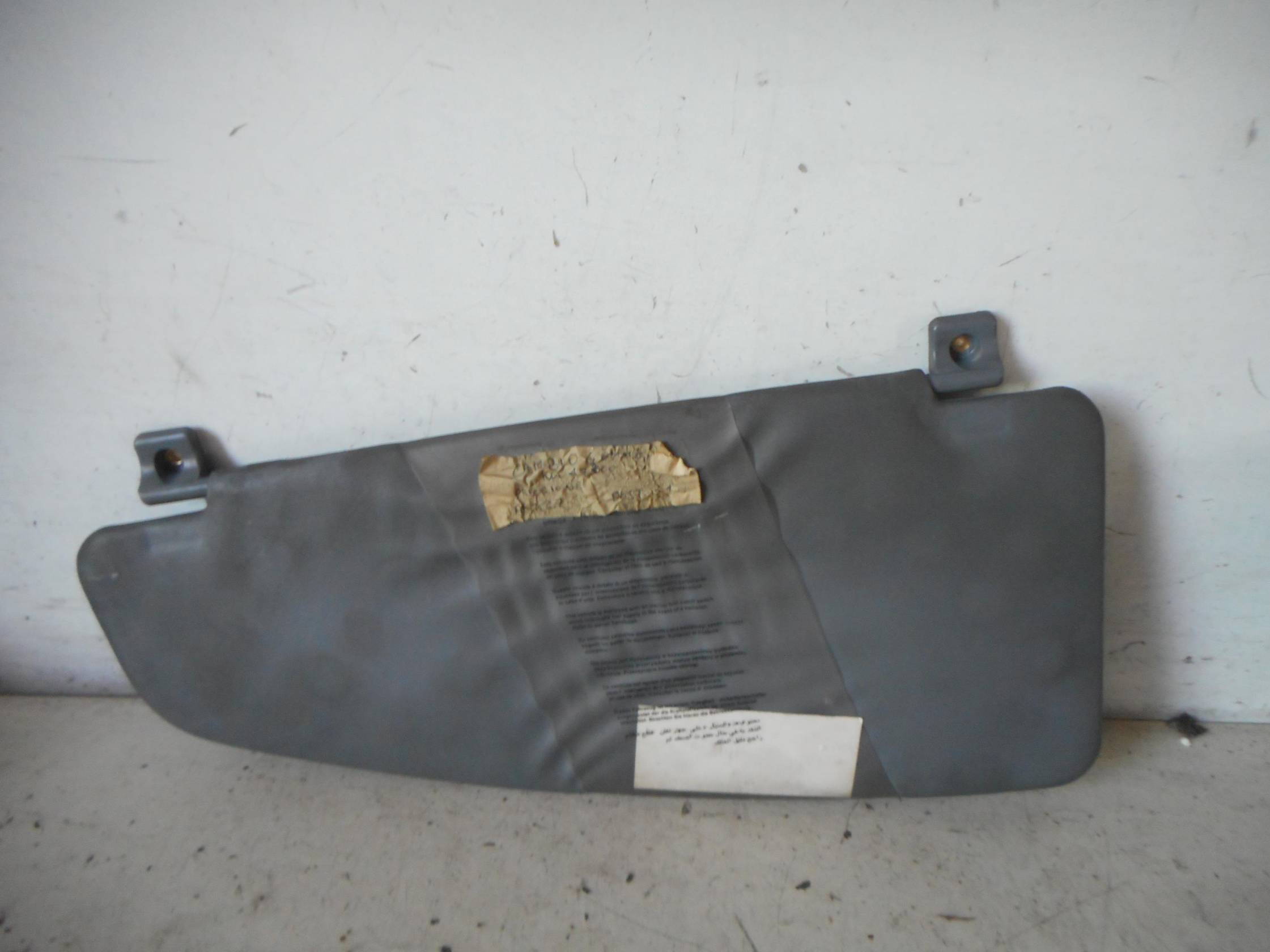 Aletta parasole parabrezza dx.